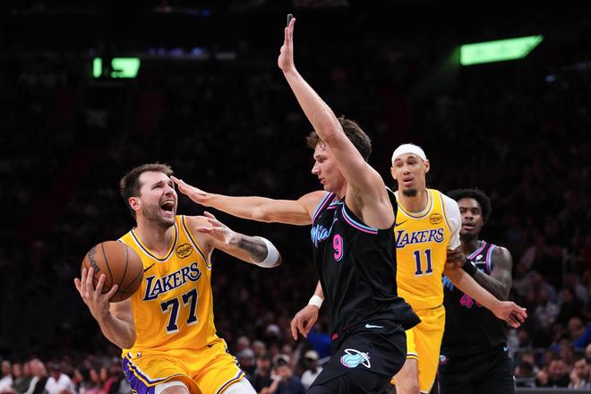 湖人双杀热火豪取8连胜 东契奇背靠背砍100分创历