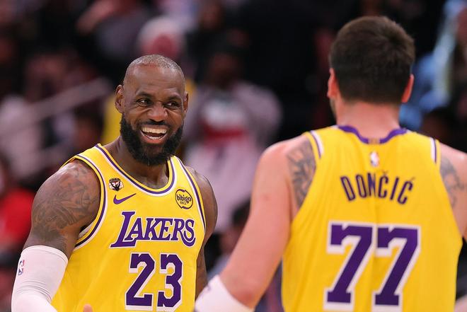 湖人双杀热火豪取8连胜 东契奇背靠背砍100分创历